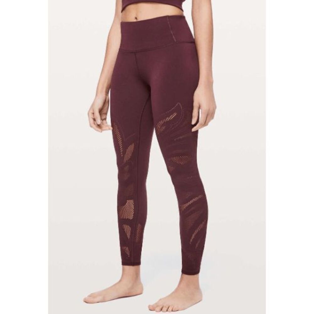 Lululemon size 12 burgundy Reveal tights/ leggings *FLAW*